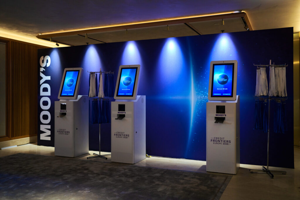 Touchscreen kiosks to print event badges next to lanyards